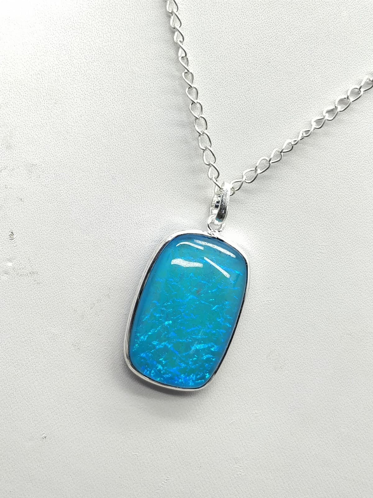 Sky Blue Fire Opal Pendant 33x20x8 mm, Rectangle & Smooth wt in 45 Ct.