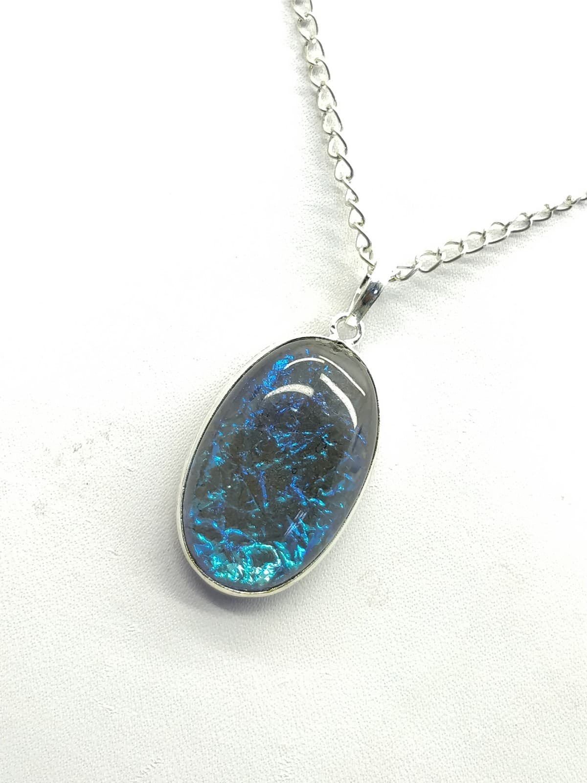 Blue Fire Opal Pendant 40x19x8 mm, Oval & Smooth wt. in 41 Ct. MG205