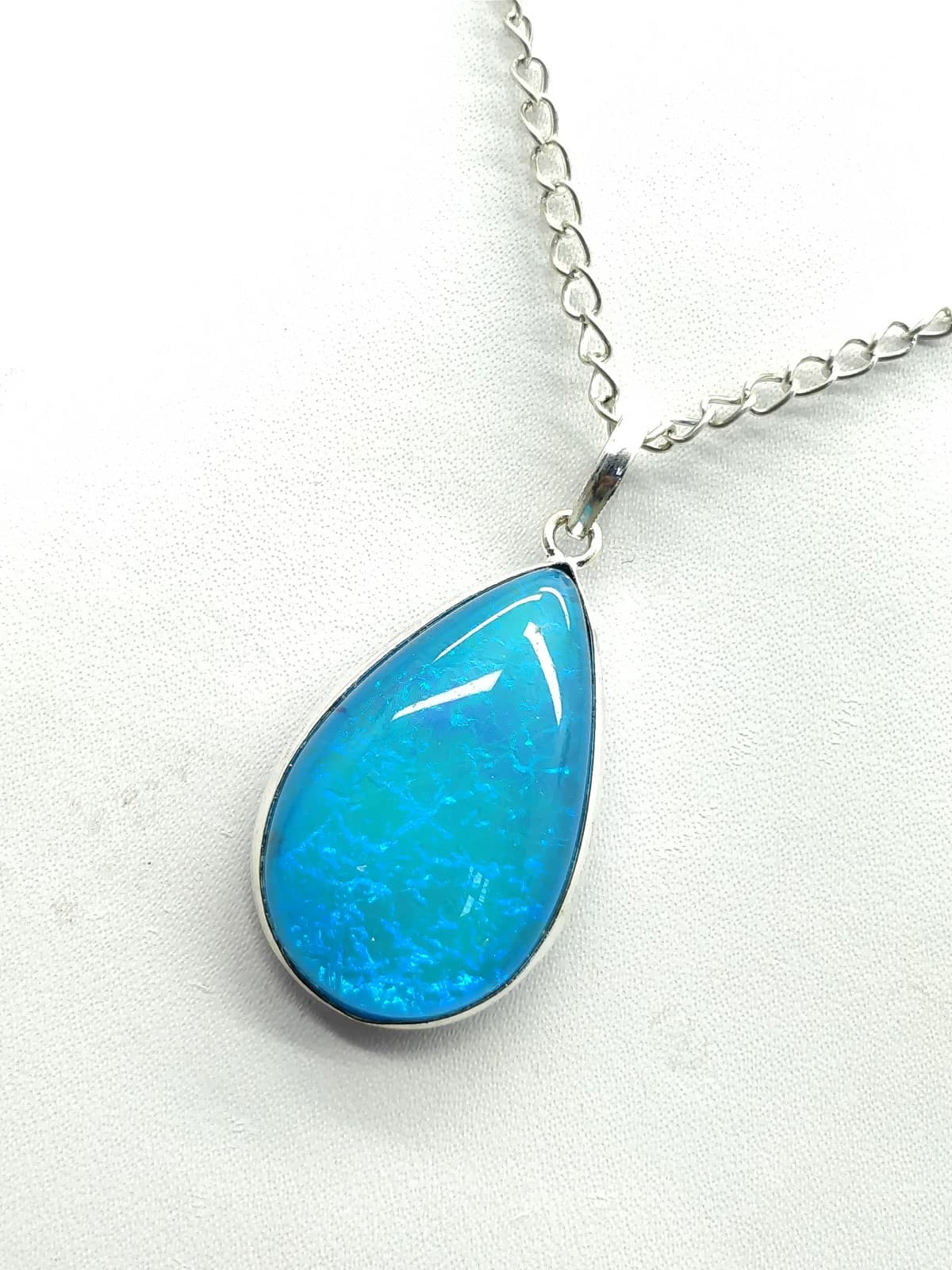 Sky Blue Fire Opal Pendant 40x19x8 mm Pear & Smooth wt in 35 Ct. MG210