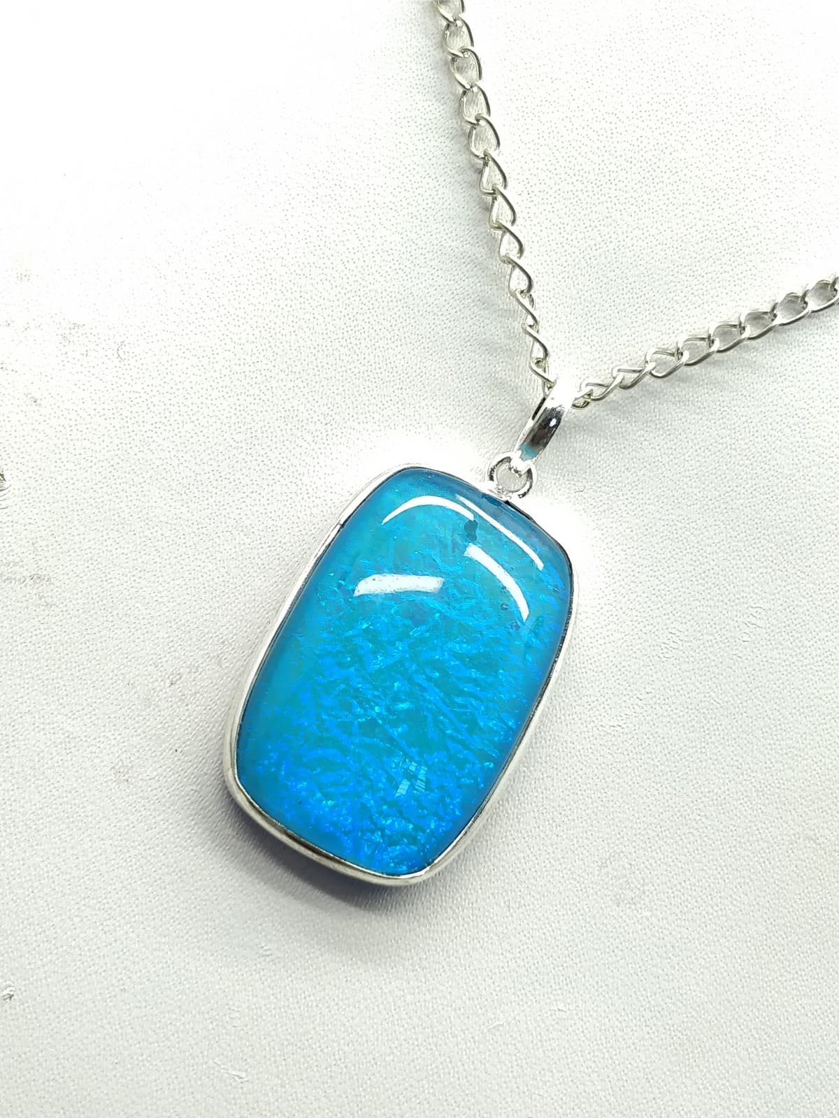 Sky Blue Fire Opal Pendant 41x21x8 mm, Rectangle & Smooth wt. in 46 Ct