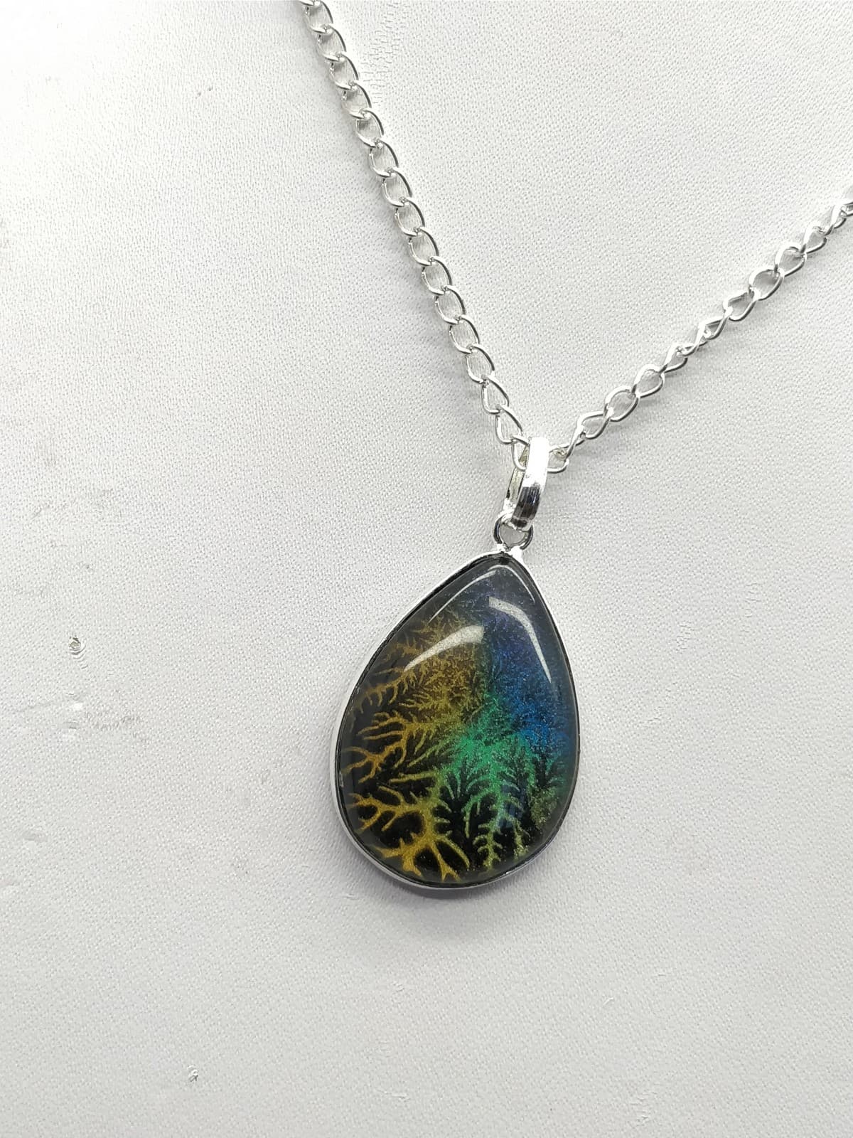 Black Tree Opal Pendant 39x25x5 mm, Pear & Smooth wt. in 27 Ct